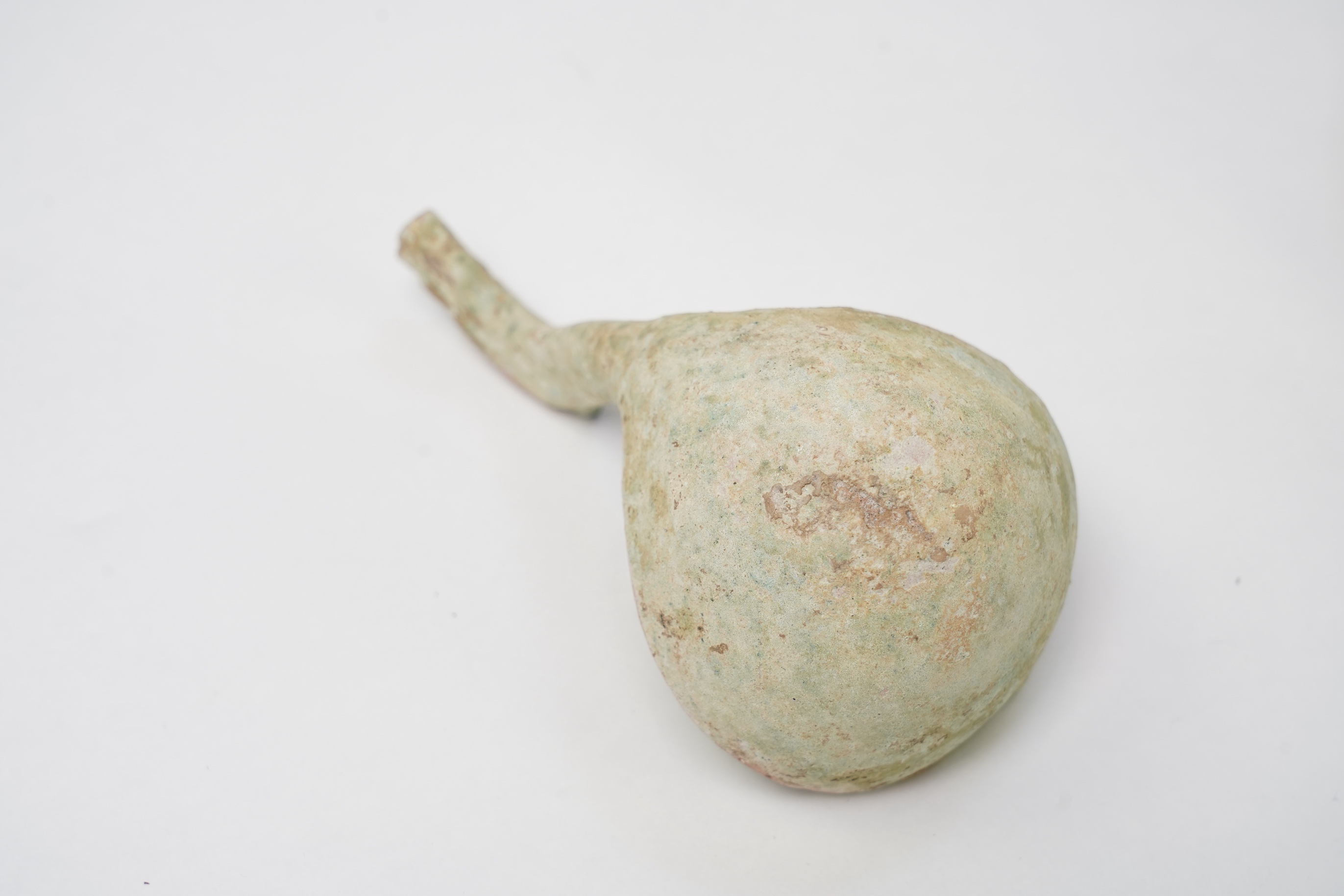 A Chinese earthenware scoop and a similar ladle, Han Dynasty (1st-2nd century A.D.)